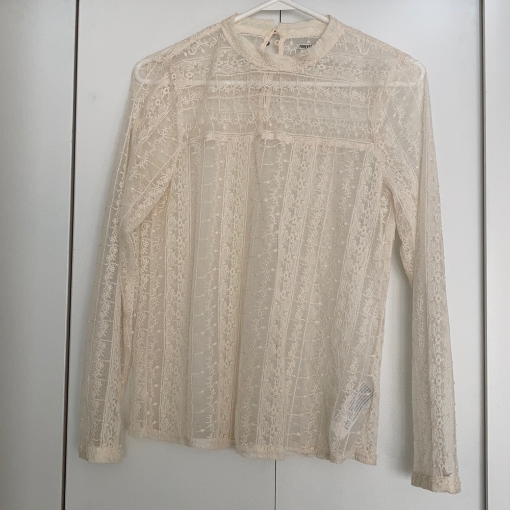 Ivory lace blouse with button neck closure